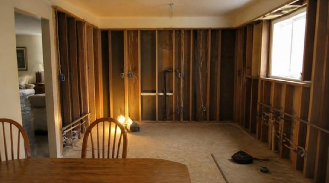 Opened to the studs: new wiring and plumbing